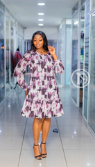 Elegant purple geometric print shift with ruffled hem