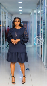 Elegant navy blue shift with ruffled hem