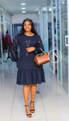 Elegant navy blue shift with ruffled hem