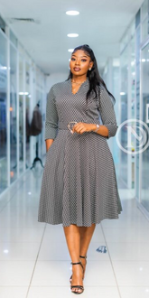 Elegant houndstooth midi dress