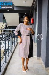 Elegant stylish checkered midi with side pleats