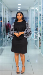 Elegant black leopard-sleeve dress