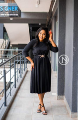 Elegant black pleated midi dress
