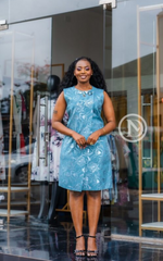 Chic sleeveless Maya blue sheath with floral motif