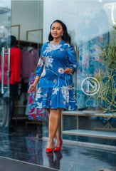 Elegant blue floral shift dress with ruffled hem