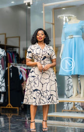 Elegant beige with black skater dress
