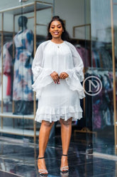 Chic white shift dress with layered ruffles
