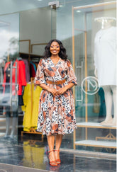 Brown and beige abstract print midi dress