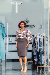 Elegant brown and taupe two-piece dress.