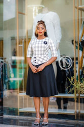 Elegant checkered and black peplum skater dress