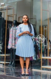 Elegant light blue pleated skater dress