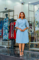 Elegant light blue skater dress with pleats