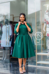 Elegant deep green pleated skater dress