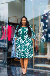 Elegant green and white shift dress