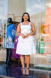 Elegant sleeveless white skater dress with gold accents