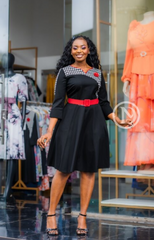 Elegant black skater dress with houndstooth yoke