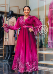 Elegant magenta ombré gown with poet sleeves