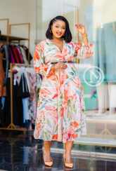 Elegant coral orange and green floral midi dress