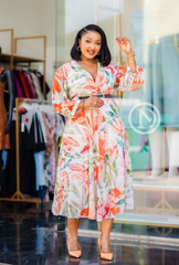 Elegant coral orange and green floral midi dress