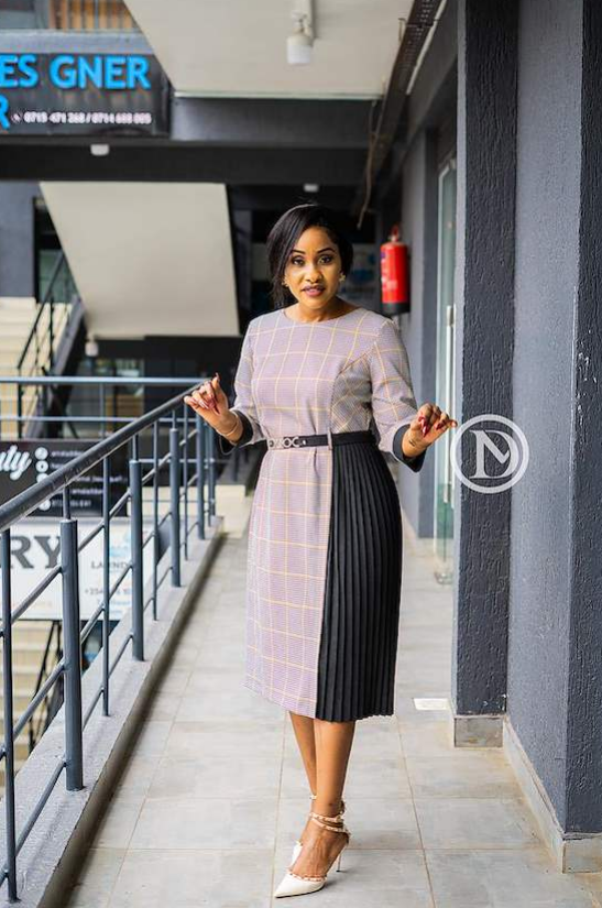 Elegant stylish checkered midi with side pleats