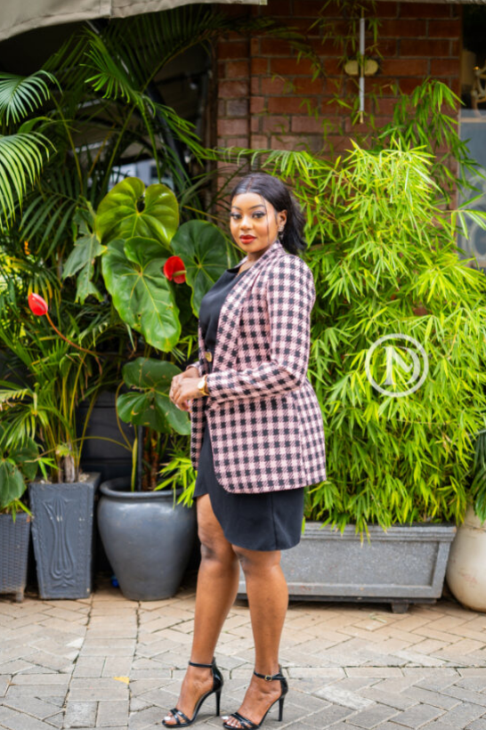 Elegant pink and black checkered blazer