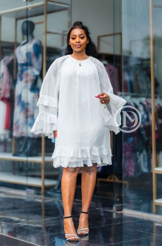 Chic white shift dress with layered ruffles