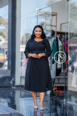 Black pleated skater dress