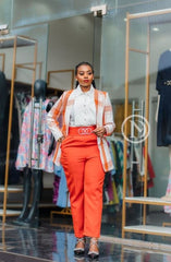 Two-piece white blouse and orange trouser