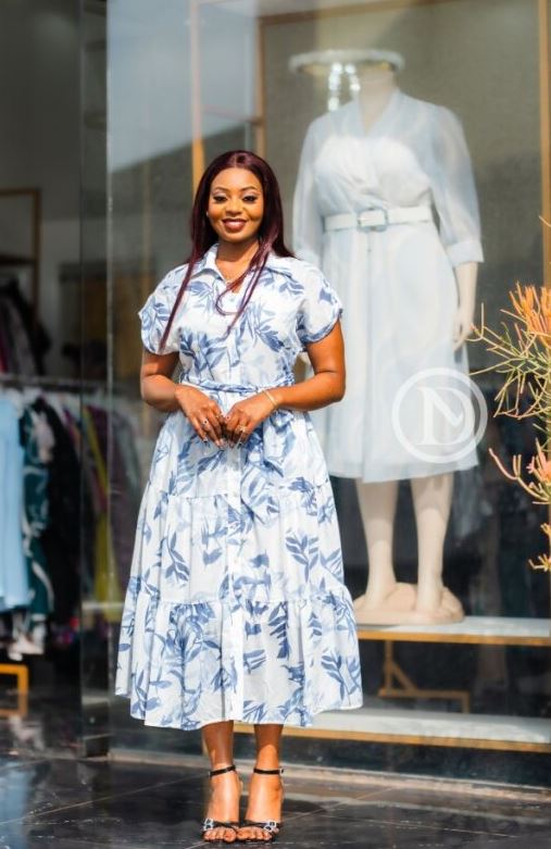 Elegant white and blue tiered floral midi dress