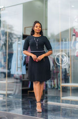 Elegant black pleated skater dress