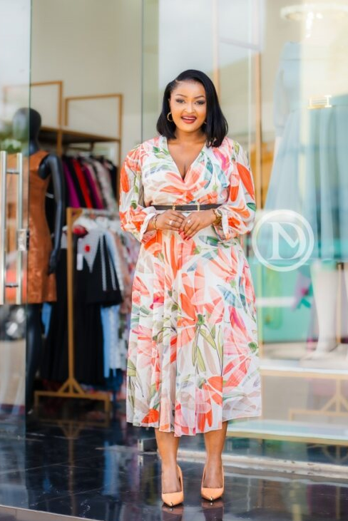 Elegant coral orange and green floral midi dress