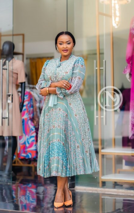 Elegant sage-green floral pleated midi dress