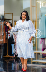 Elegant light blue and white abstract-print midi dress