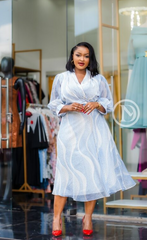 Elegant light blue and white abstract-print midi dress