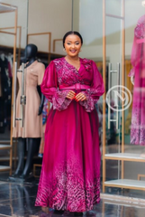 Elegant magenta ombré gown with poet sleeves